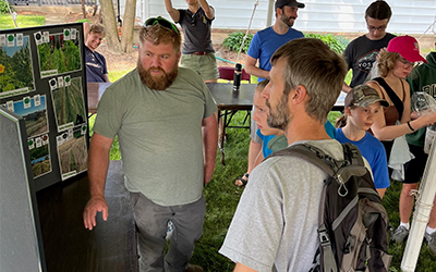 Farmer talking to the public at the dairy breakfast