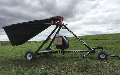 A traveling shade structure in a field