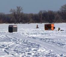 ice shanties on a frozen lake